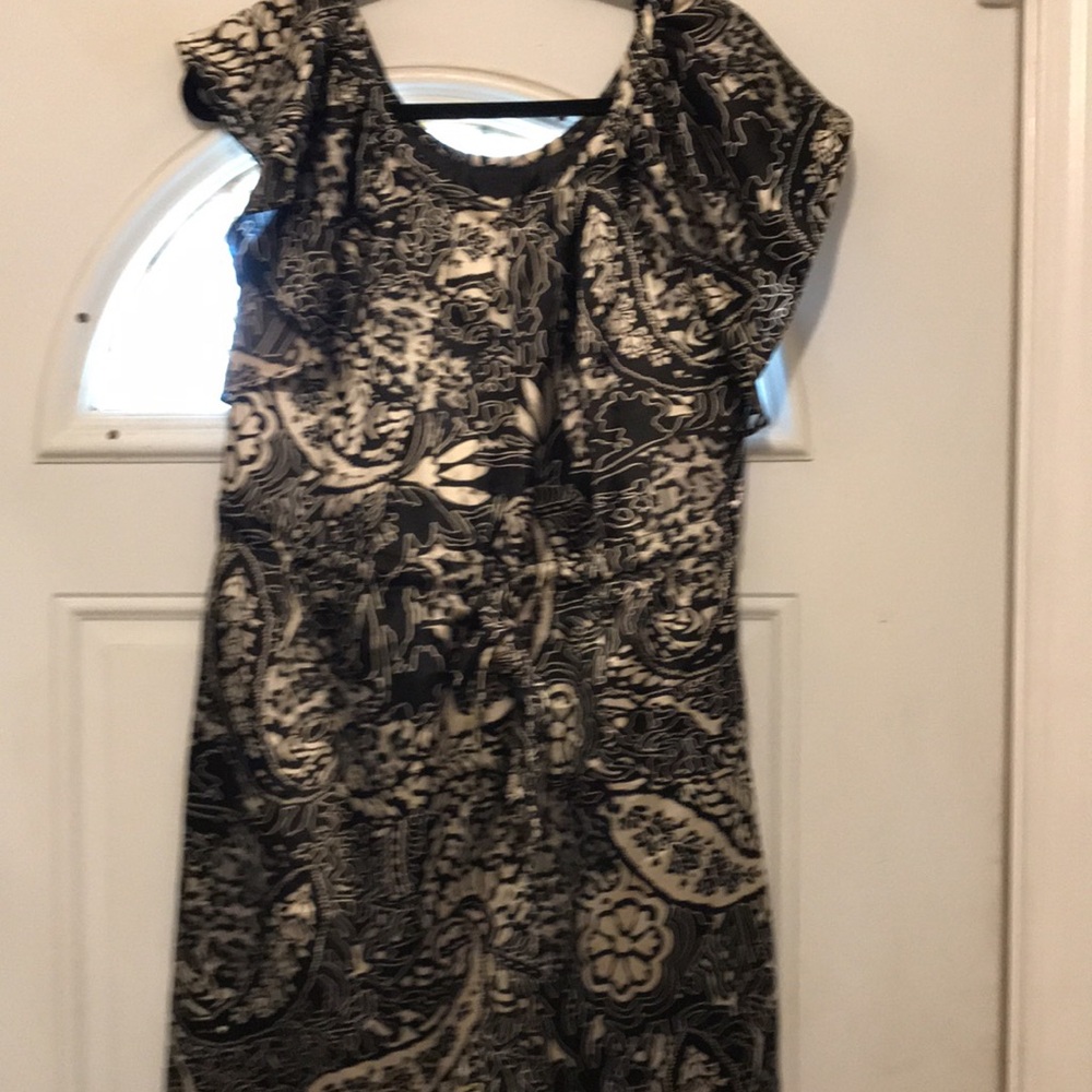 Emmelee mini dress with neck ruffle and high waist rope to adjust fitting.S:S